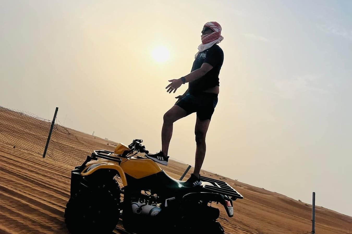 Sunset Desert Safari: Quad Bike, Sandboarding, Camel Ride + BBQ Dinner - Photo 1 of 17